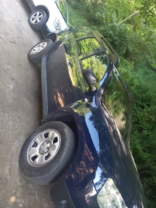 Dacia Duster 1,6 benzină  an 2011 – fotografia 5 din 6