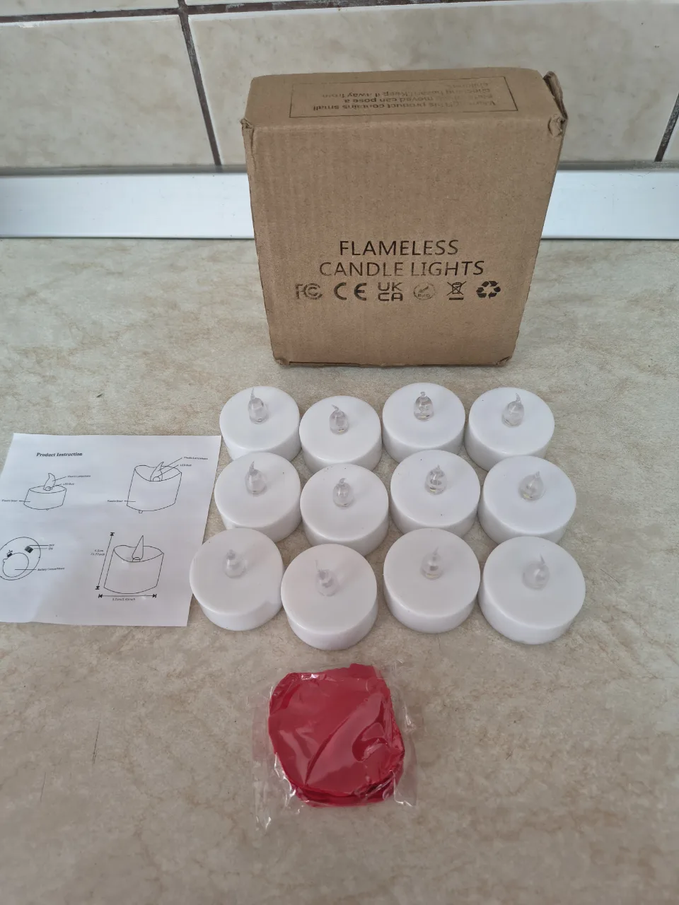 Set 12 lumânări tip pastila cu led și petale de trandafir cu – fotografia 1 din 5