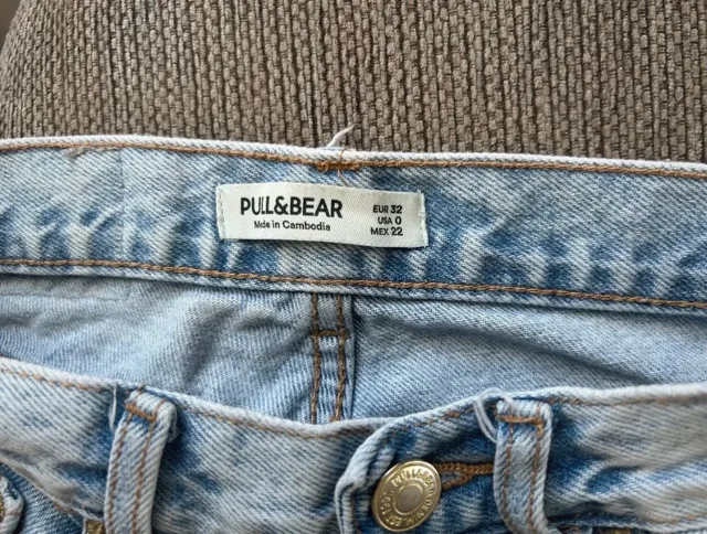 Blugi rupți talie înaltă – fotografia 2 din 4
